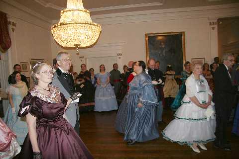 Guests watch and listen as the evening draws to a close.
